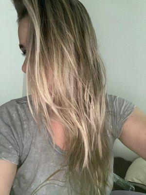 Sandy beige blonde highlights toned to perfection