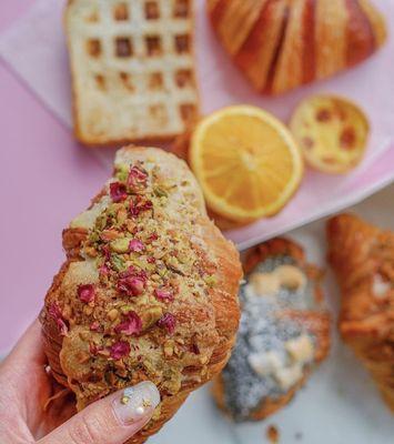 Close up: Pistachio Rose Almond Croissant