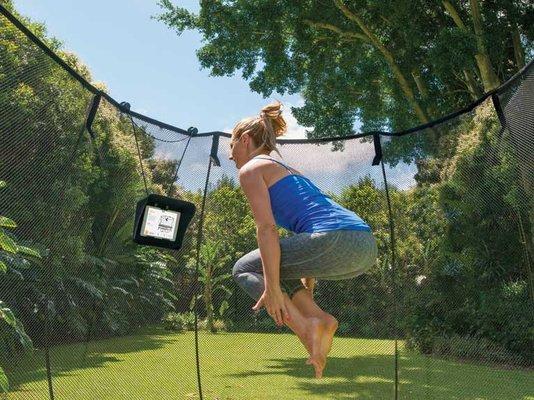 Springfree Trampoline featuring tgoma interactive gaming technology. The World's First Smart Trampoline is also the World's Safest.