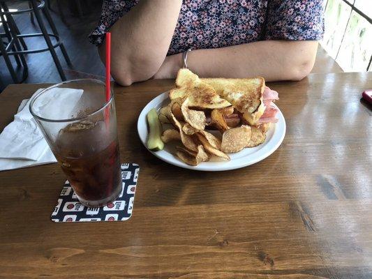 Ham, cheese and pineapple sandwich with homemade chips!  Great food!