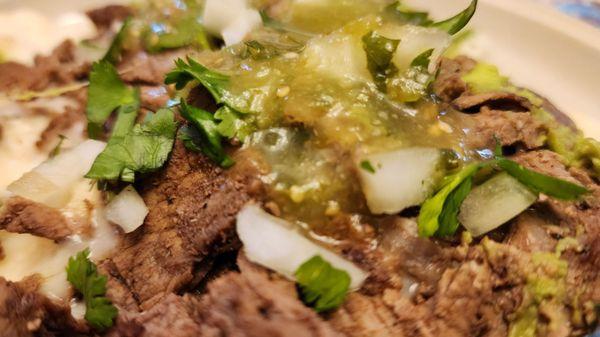 Added onions, cilantro & tomatillo salsa to carne asada quesadilla (6/19/23)