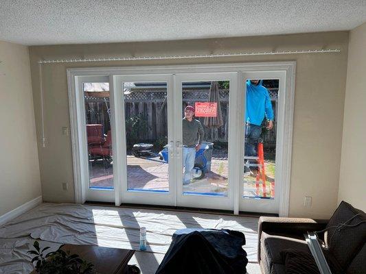 After photo of a custom French door installed where a window used to be.