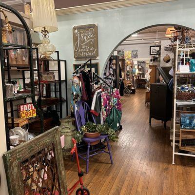 Antique store booths with clothes and vintage items