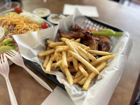 Hot and sweet bbq wings and fries