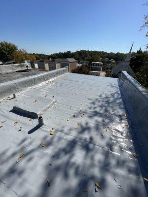 Old flat Roof flashing repair and and coated with silicone to bring back to life.