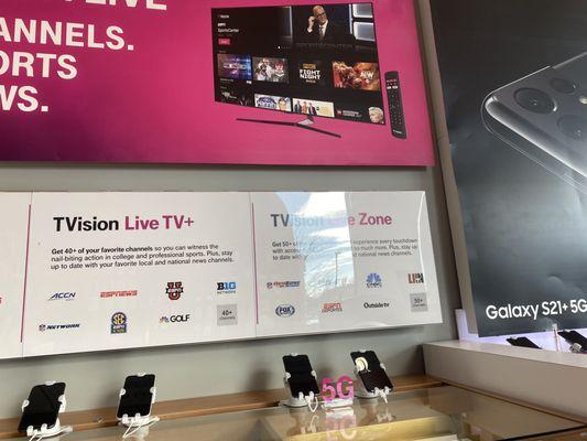 Large display of phones plus TVision banner!