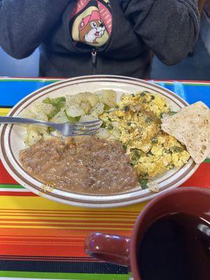 Thomas plate which is eggs with peppers and taters with beans.