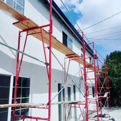 Our scaffolding team is looking good. This home we started sandblast then stucco with a nice twenty thirty smooth finish.