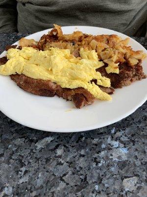 Two eggs, real corned beef hash, potatoes.