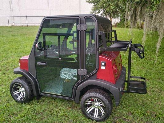 Maroon CV-II golf cart with real air conditioning