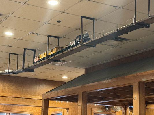 They have an actual working overhead train moving on its track above you