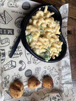 Build Your Own Mac & Cheese with pasta, cheese sauce, broccoli, corn, scallions, parmesan, and mozzarella.   Side of 3 mac and cheese bites.