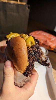 A true smashed burger where it's flattened and gets the benefit of a crispy beefy char