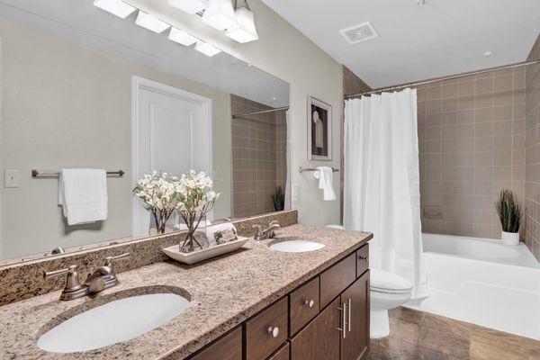 Bathroom with double vanity at The Lodge at Westover Hills