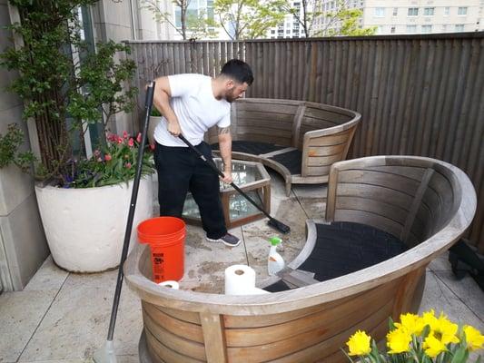 We scrub clean your patio area.