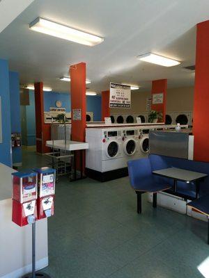 Nice clean machines, plenty of folding tables, and lots of laundry carts.