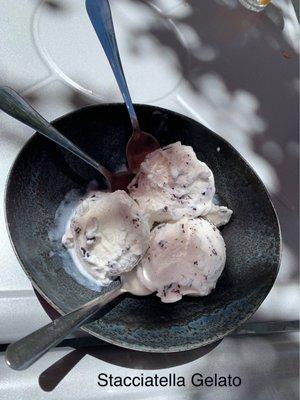 Stracciatella Gelato is a vanilla gelato with pieces of chocolate.