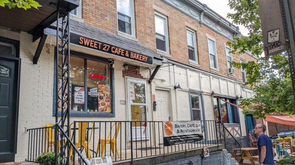 Front fascade of Sweet 27 Restaurant & Bakery.  Hmmm was it really Cafe so words fit? Extends to end of the corner