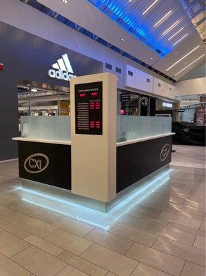 New currency exchange desk in front of Adidas