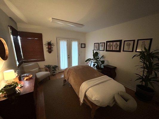 Here is one of our massage therapy rooms. We strive to make it as comfortable and cozy as possible.