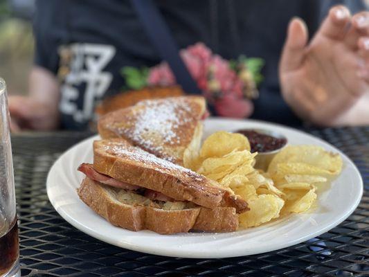 Monte Cristo Sandwich, kettled cooked potato chips, and raspberry sauce.