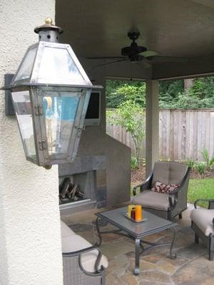 This gas light complete an outdoor living space.