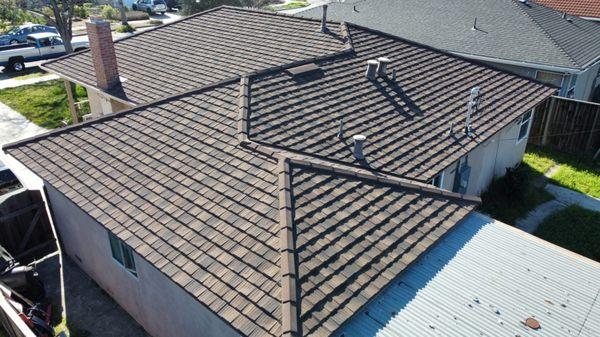 Our new beautiful metal (wood shake shaped) lifetime roof!