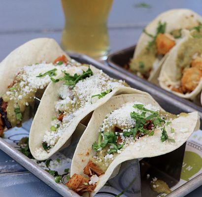 Adobado Pollo taco --Grilled chicken thigh, salsa fresca, salsa verde, cotija, cilantro.