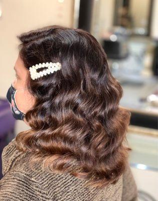 Hollywood glam style hair. It is great for weddings and fancy parties