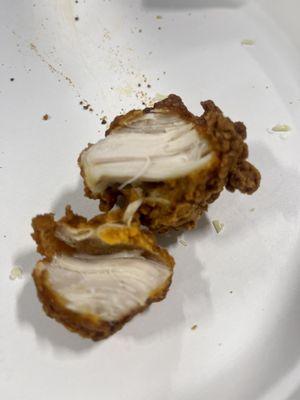 Inside of the boneless Express Hot Wings. 100% breast meat. Delicious.