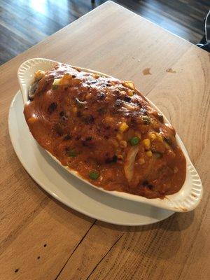 Baked pork chop over rice.