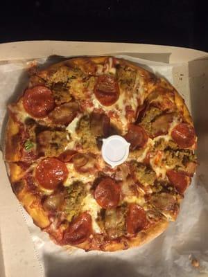 Cheese pizza add pepperoni, meatballs and bacon