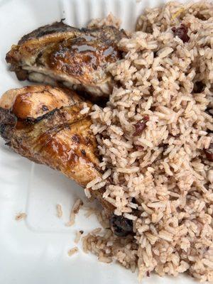 Jerk chicken with rice and peas