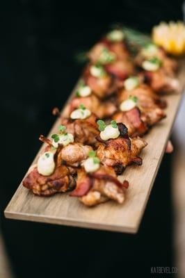 Bacon-wrapped quail appetizers (photo by Kat Bevel)