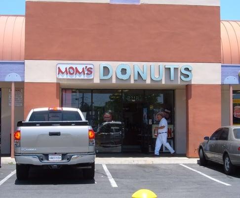 Exterior shot of the donut store while standing in the parking lot