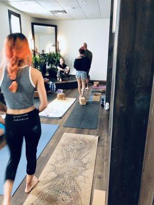 Main yoga studio with instructor stage