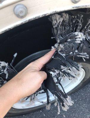 This is the blown tire on our Uhaul. It looks like fringe! Thank God we hadn't made it out into the middle of no where yet!!