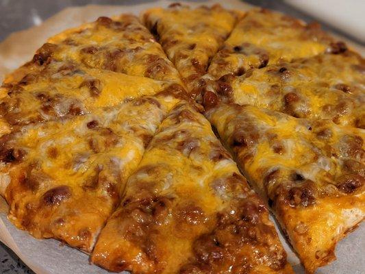 Homemade chili and cheese pizza with Tenney's dough