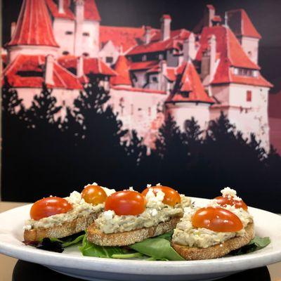 Eggplant Bruschetta - eggplant spread, feta, tomatoes, virgin olive oil