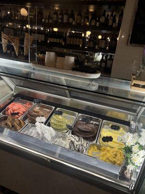 Gelato selection on a Saturday I visited. Waffle cones looked sad because waffle cones don't do well in humidity. Got a cup instead.