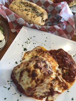 This is the lasagna and bread. The plate is probably 12" x 12", which makes the portion look small. It was not.