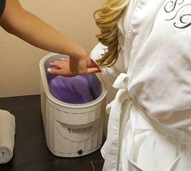 Paraffin Hand Wax Dip soothes and softens weary hands. Enjoy fresh fruit infused water and herbal tea while you wait.