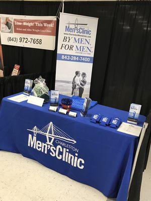 Charleston Men's Clinic booth at a Health Expo