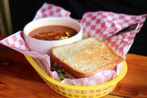 Banh Mi in Exile ($13) - sandwich w/ tofu, pickled carrot-radish, jalapeños, cilantro, garlic mayo on housemade peasant bread