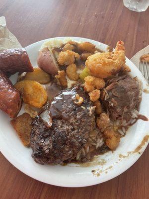 Hamburger steak beef, stew with potatoes, mashed potato and gravy and fried shrimp