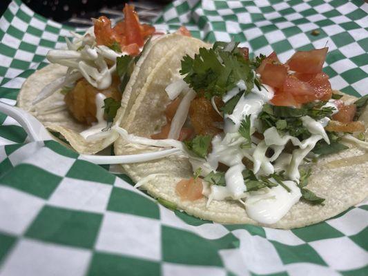 One shrimp and one fish taco... My daughter said they where so good she couldn't share