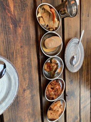 Beautiful presentation: fish cakes, tea egg, kimchi, tofu.