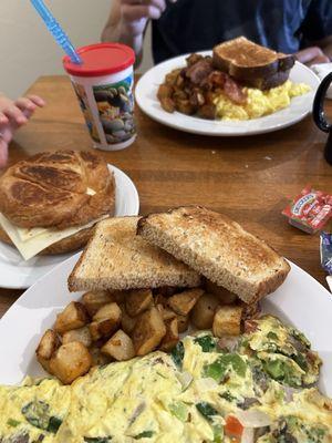 Veggie Omellete, eggs and cheese croissant, three and three