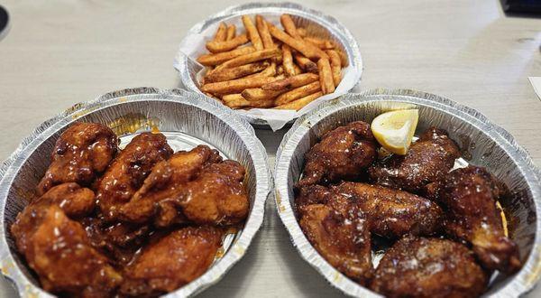 Lemon pepper and Mango habanero  chicken wings. Order of fries