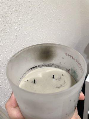 Winter Candy Apple Defective Candle. Stopped burning halfway through AND emit lots of block smoke. Only burned it twice.